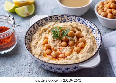 Hummus, chickpea on plate, traditional delicious Turkish food (Turkish name; Humus) - Shutterstock ID 2025942641