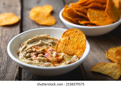 Hummus and crunchy corn chips