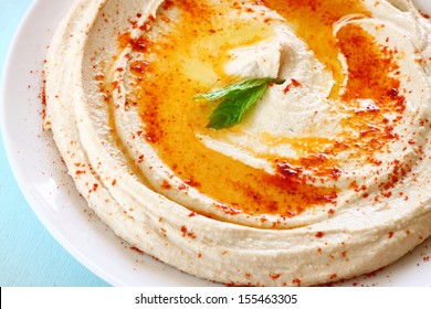 Hummus Dip Plate On Wooden Table 