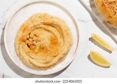 Hummus On A White Plate