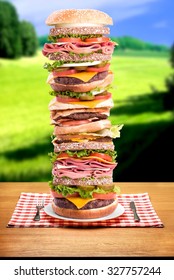 Humongous Tall And Massive Burger Sandwich