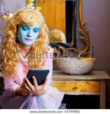 Humor woman in bathroom with ebook tablet and green mask