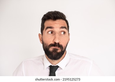 Humorous Bearded Man Making Funny Face. Male Model In Suit Fooling Around. Portrait, Emotion Concept