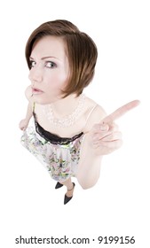 Humorous Photo Of An Angry Brunette Woman Through A Fisheye Lens Pointing Her Finger. Isolated On White.