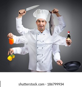 Humorous Portrait Of A Chef With Many Hands On Gray Background