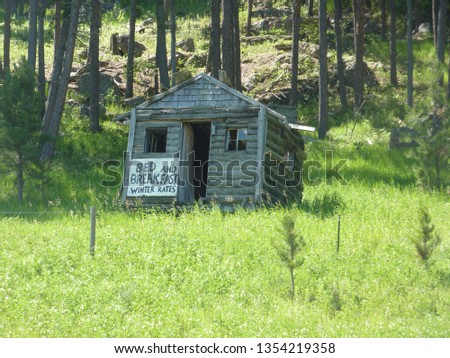 humorus photo of old beat up shack being called a bed and breakfast in the Black Hills of South Dakota