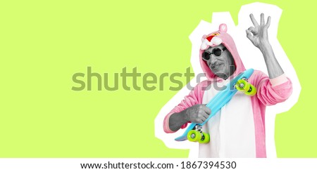 Humour. Senior man in funny suit like pink pantera isolated on green background. Collage in magazine style. Flyer with trendy colors. Copy space for ad. Fashion and style concept.