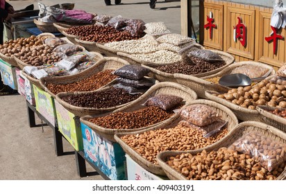 HUNCHUN, CHINA - MARCH 31, 2012: An Assortment Of Nuts In A Street Market In Hunchun City. Hunchun Is A County-level City In The Yanbian Korean Autonomous Prefecture.