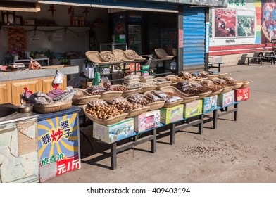 HUNCHUN, CHINA - MARCH 31, 2012: An Assortment Of Nuts In A Street Market In Hunchun City. Hunchun Is A County-level City In The Yanbian Korean Autonomous Prefecture.