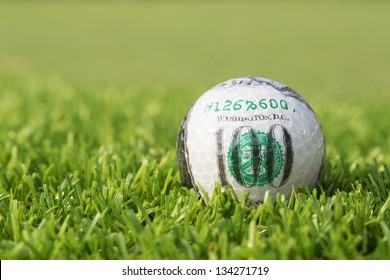 Hundred dollar on golf ball