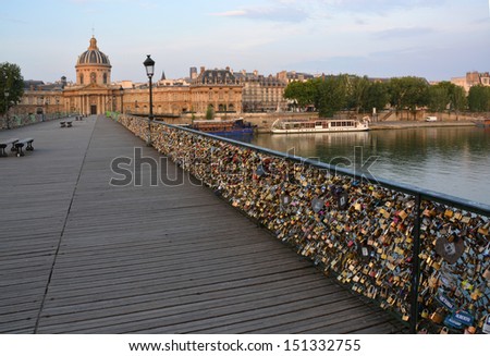 The hundreds of thousands of romantically love inscribed padlocks on the Pont Des Arts Bridge, Paris France.