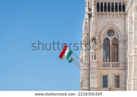 Hungarian Flag at Hungarian Parliament Building - Budapest, Hungary