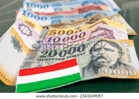Hungarian forint, paper money with Hungarian flag, Financial and economic concept