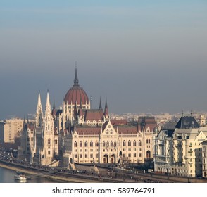 Hungarian Parliament In Budapest Looking At It Sideways With Layer Of Grey Smog On The Horizon