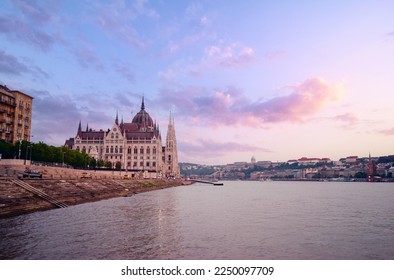 The Hungarian Parliament Building on the bank of the Danube in Budapest at sunset time.