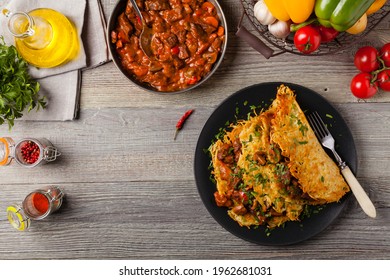 Hungarian Potato Pancake With Goulash. Top View. 