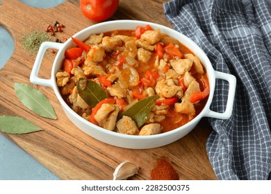 Hungarian turkey stew in tomato sauce and red pepper - Shutterstock ID 2282500375