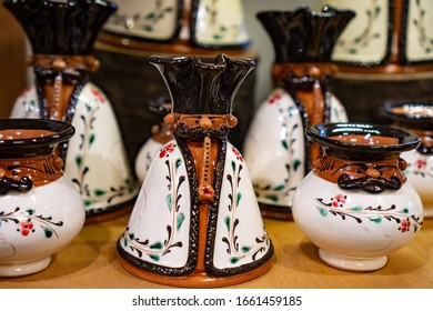 Hollókő, Hungary / 13.04.2019: Traditional Funny Shepherd Hungarian Handmade Chinaware In Hungary Holloko Shop