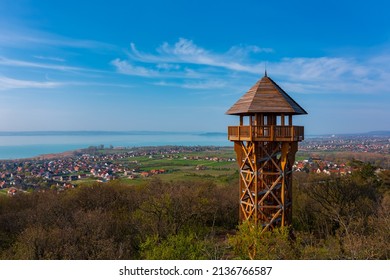 Alsóörs, Hungary - Aerial view about lookout tower on the top of Somlyo mountain, with lake Balaton at the background. Spring landscape. Hungarian name is Somlyó-hegyi kilátó.