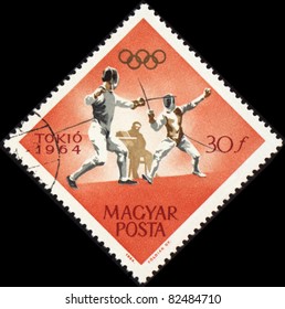 HUNGARY - CIRCA 1964: A Post Stamp Printed In Hungary Shows Fencing, Devoted To Olympic Games In Tokio, Series, Circa 1964