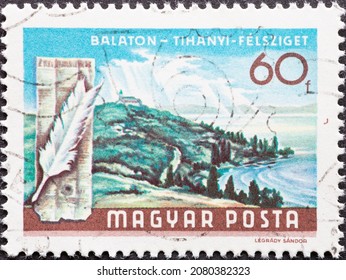 HUNGARY - CIRCA 1968: A Post Stamp Printed In Hungary Showing The Landscape At Lake Balaton With Tihanyi Peninsula And A Quill Pen 