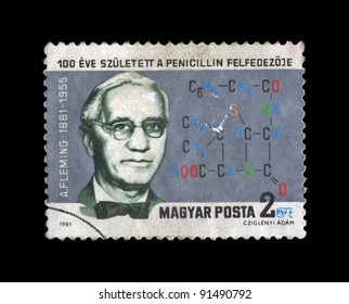 HUNGARY - CIRCA 1981: Canceled Stamp Printed In Hungary Shows Famous Medical Specialist, Penicillin Founder Alex Fleming, Circa 1981. Vintage Postal Stamp Isolated On Black Background.