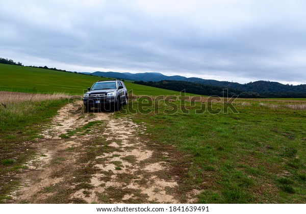Hungary Vertes mountain range Oct, 19,\
2020: Toyota 4Runner SUV touring along on the forestry tracks and\
hunting grounds in Central Europe mountain\
range.