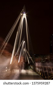 Hungerford Bridge And Golden Jubilee Bridges In London At Night