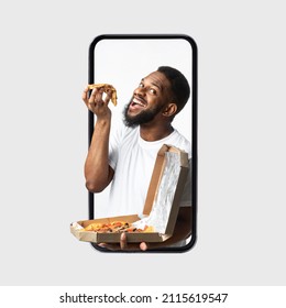 Hungry African Guy In Smartphone Screen Eating Slice Of Pizza Smiling To Camera Posing Over White Background In Studio. Pizza Delivery Application Advertisement, Mobile Offer Concept. Square