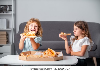 Hungry Children Eating Pizza. Excited Kids Eating Pizza.