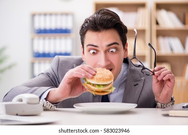 Hungry Funny Businessman Eating Junk Food Stock Photo (Edit Now) 608398841