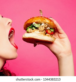 Hungry Girl With Opened Mouth Eating Big Hamburger.