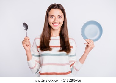 Hungry Lady Holding Spoon And Empty Plate Ready For Dinner Wear Striped Pullover Isolated White Background