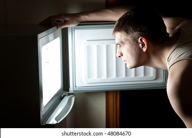 Hungry Man Opening Fridge.