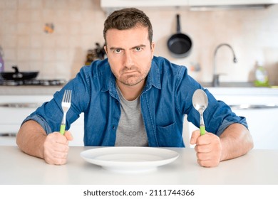 Hungry Man Waiting To Eat Feeling Starved