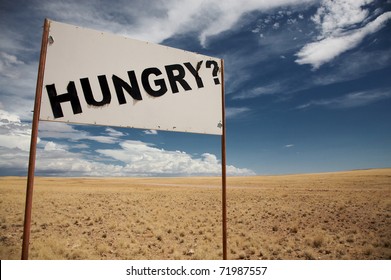 Hungry signboard in the de desert of Namibia