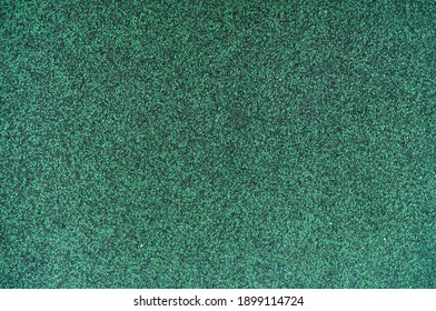 Hunter Green Color Shingle Roof Texture Background. Roofing Material. Dense Of Rough Dark Green Granules Surface Of Shingle Roof Texture Background. Shingle Roof Made Of Asphalt, Plastic Fiberglass.