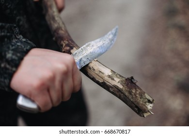 Hunter with a knife.