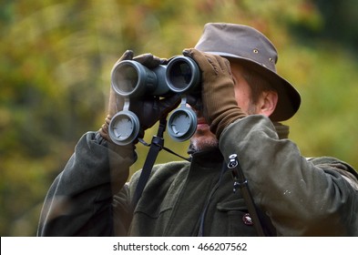 Hunter Looking Through Binoculars