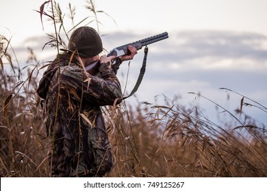 Hunter Shooting In The Field