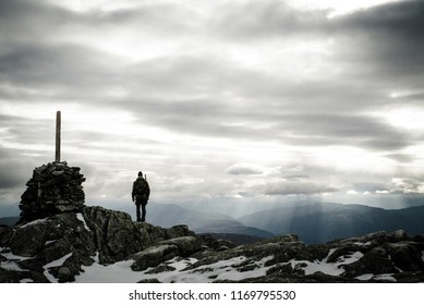 Hunter At The Top Of The Moutain