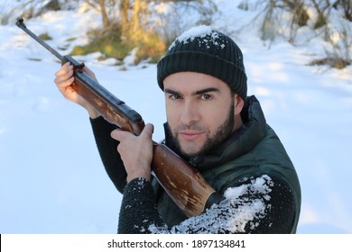 Hunter in the winter with snow