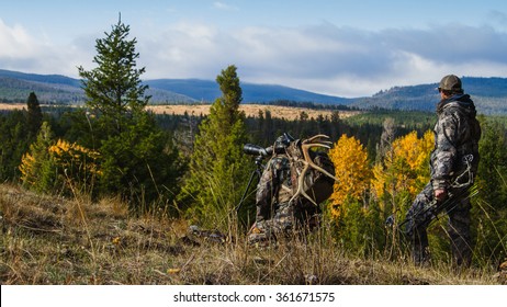 Hunters On A Mountain Ridge