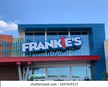 Huntersville, North Carolina, USA – Circa June 2019: The Newly Opened Frankie's Fun Park In Charlotte Area Offering Bowling, Dark Ride, Mini Golf, Fun House, Laser Tag, Swings, Arcade, Drop Zone Etc