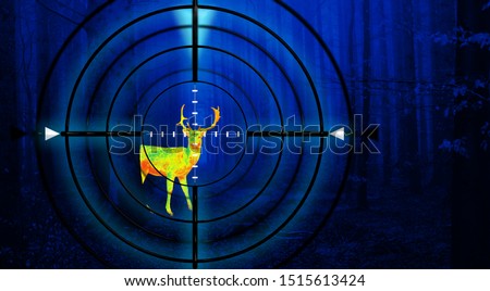 Hunting a deer in a forest at night using thermal imaging. Scope view with crosshair.