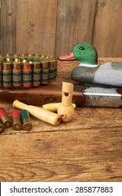 Hunting. Duck decoys and wooden whistles.