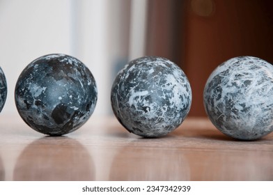 hunting eggs in springtime. spring eastertime holiday. easter egg. happy easter. paschal spring holiday. bunny hunt begin. egg hunt. traditional galaxy painted eggs on wood table. horizontal.