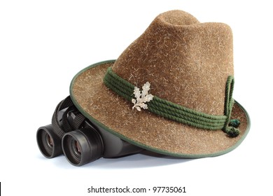 hunting gear - old traditional hunting hat and binoculars over white background - Powered by Shutterstock