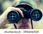 hunting, war, army and people concept - close up of young soldier, ranger or hunter with binocular and virtual projection observing forest