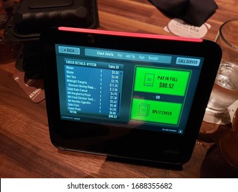 Huntington Beach, California, United States - 04-07-2019: A View Of An Automated Bill Pay Table System At A Local Restaurant.